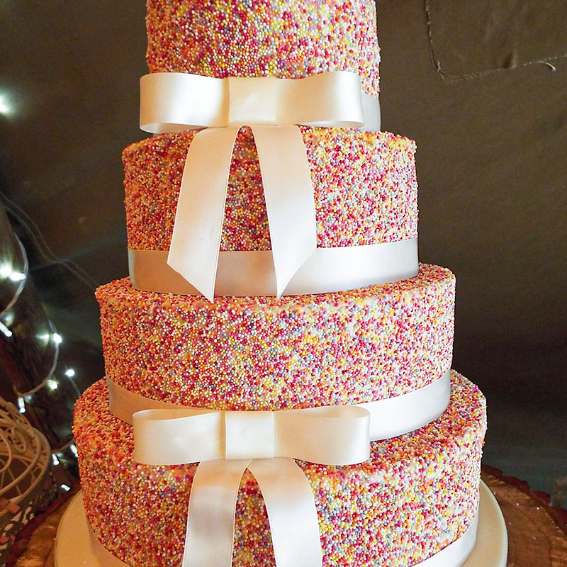 hundreds thousands wedding cake