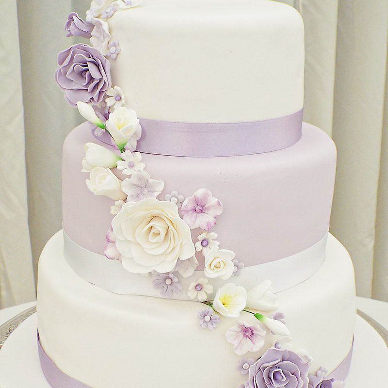 three tier white lilac roses cascading